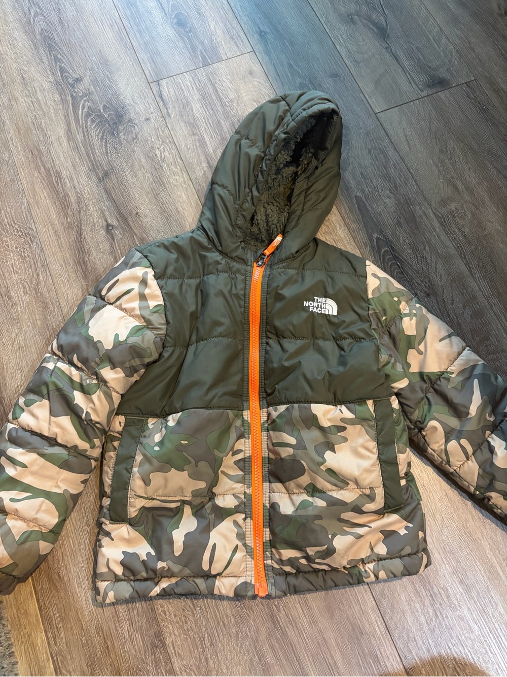 The North Face Kids Olive Green Camo Puffer Jacket with Orange Zipper